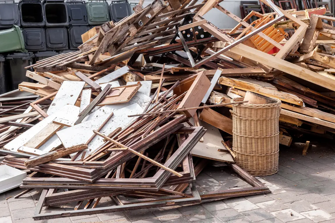 Discarded wood, furniture pieces and other materials at a collection site
